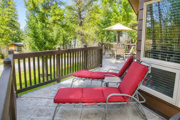 Patio with lounge chairs and outdoor dining table